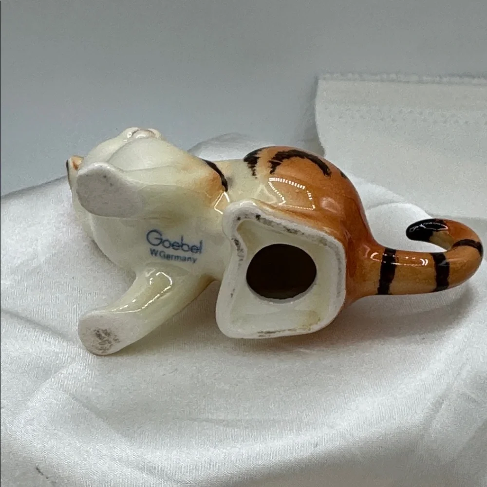 2 Goebel Cat Figurines, approximately 3” long each; and 2” tall